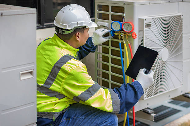 Professional Emergency Ac Repair technician working in Fredericksburg, PA